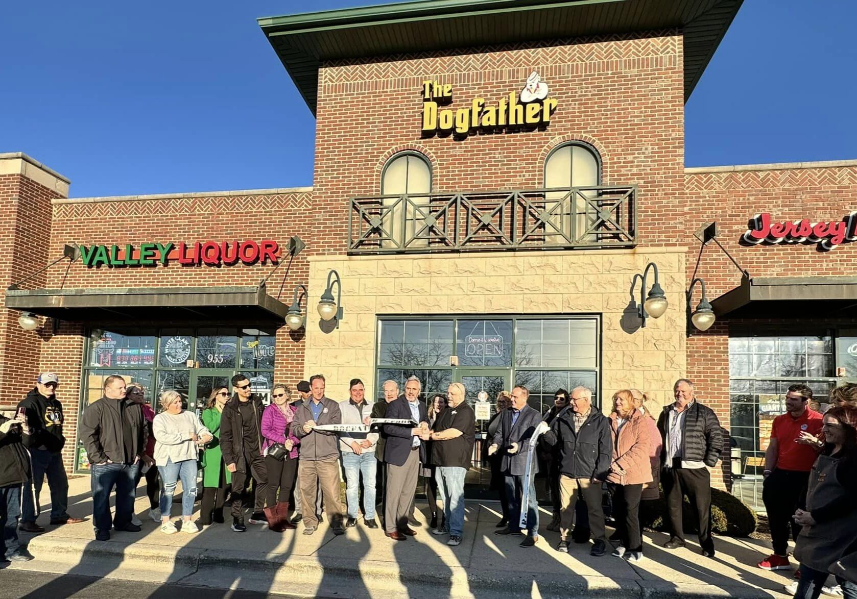Ribbon Cutting with new owners @ Dog Father